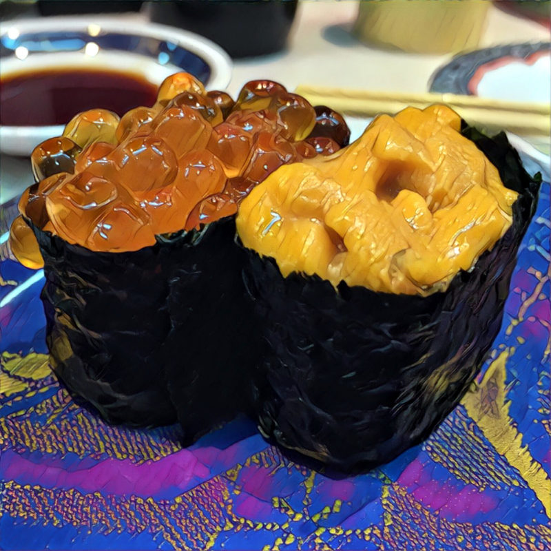 Sushi gunkanmaki with sea urchin (uni) roe and salmon roe (ikura)